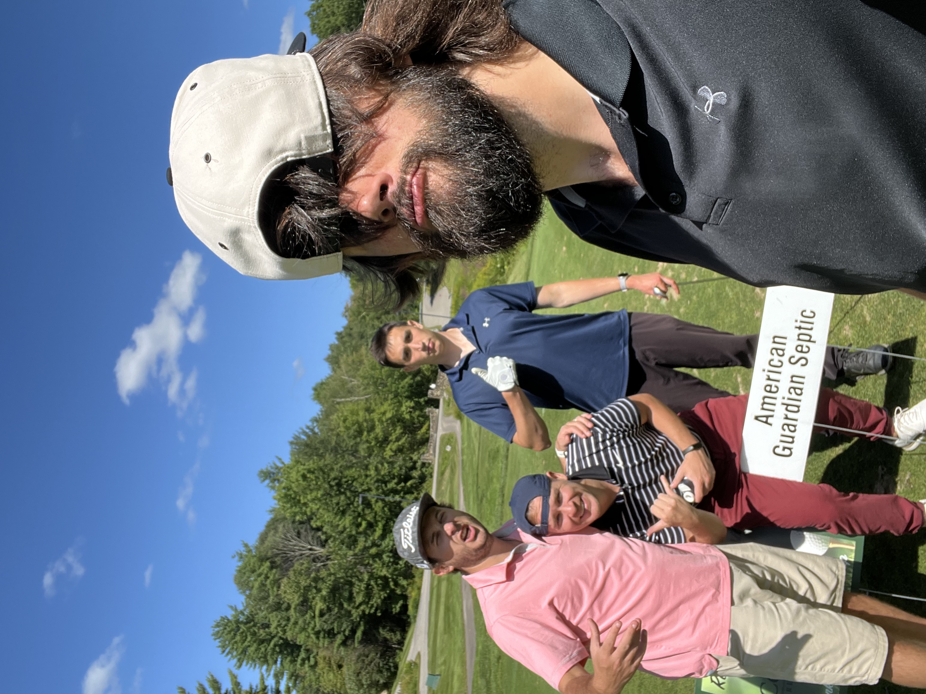 Bobby golfing with friends